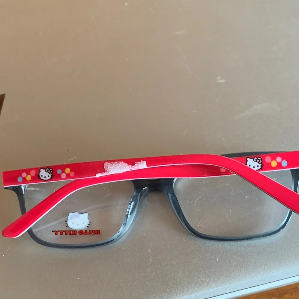 Hello Kitty Black Frame Sunglasses with Pink Patterned Temples